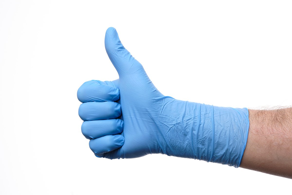 Blue 30 cm long cuff nitrile examination glove worn on a hand