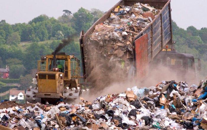 Big truck dropping waste unto landfills