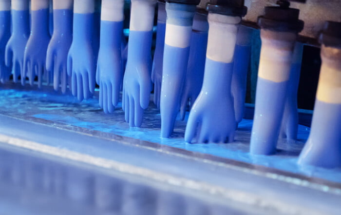 Glove dipping line accelerators